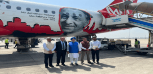 Left to right: The MD of AirAsia India, the CEO and MD Praj Industries, the Honorable Minister of Petroleum and Natural Gas, and the chairman of IOCL alongside a ministry official